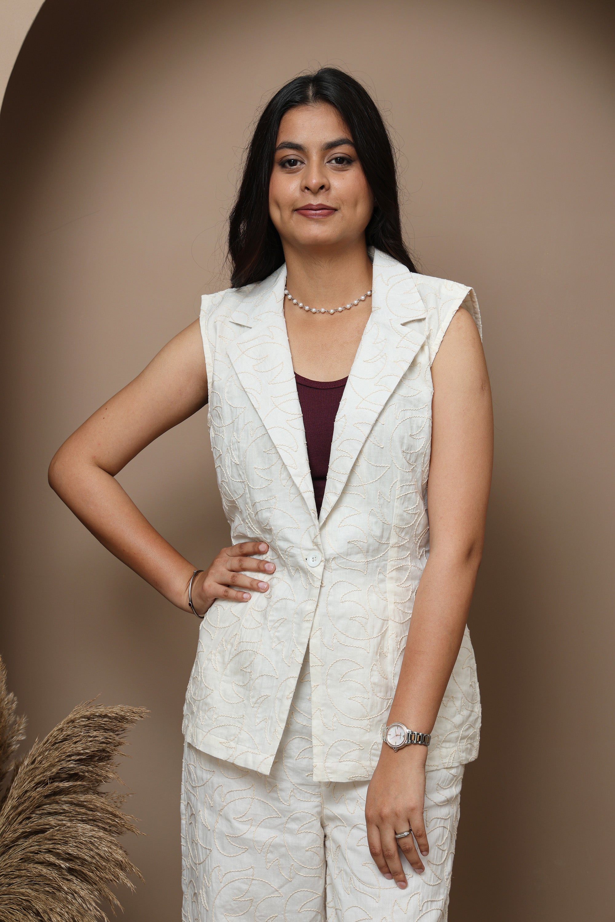 Off-White Sleeveless Jacket & Tailored Trousers Set