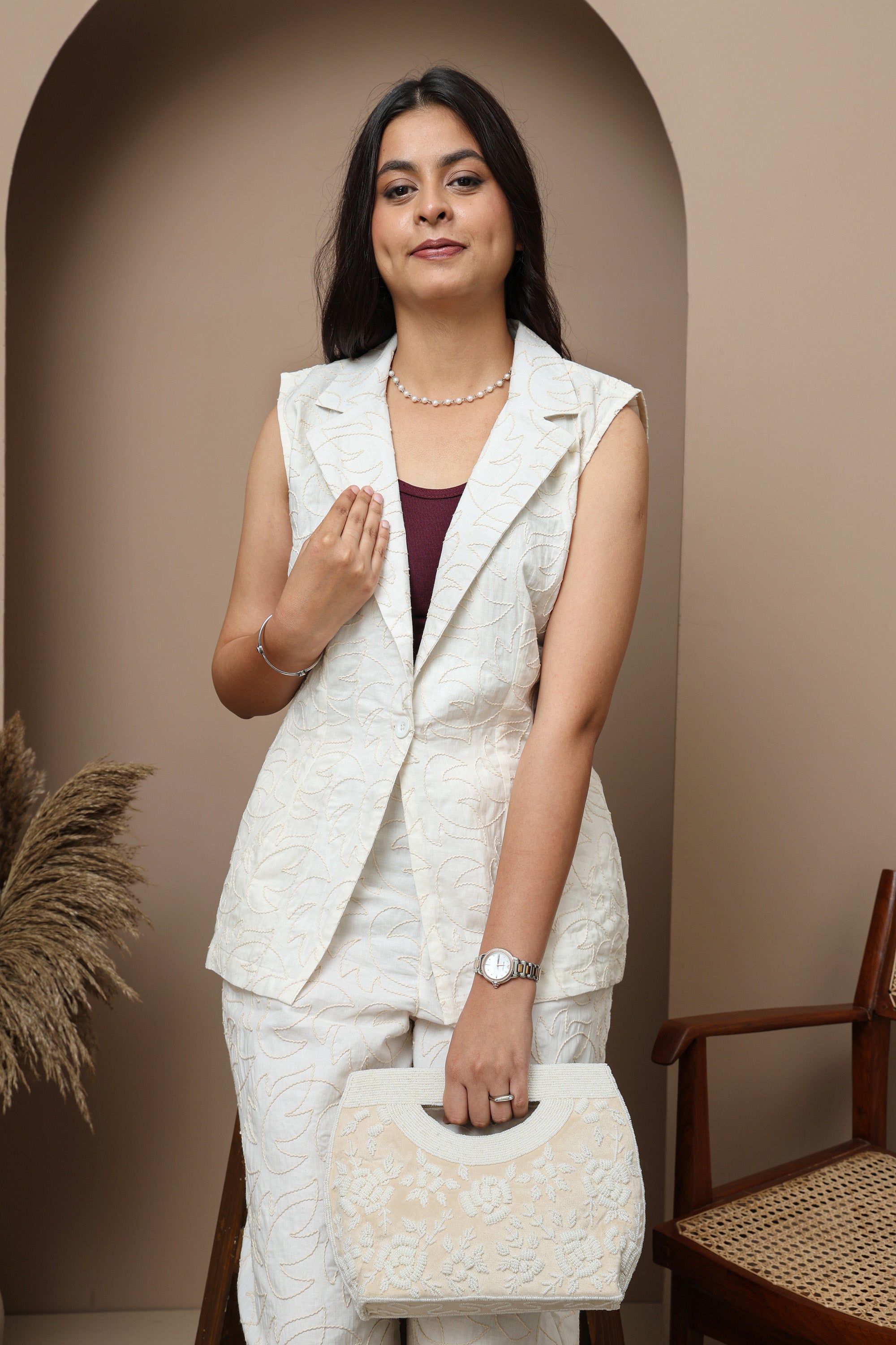 Off-White Sleeveless Jacket & Tailored Trousers Set