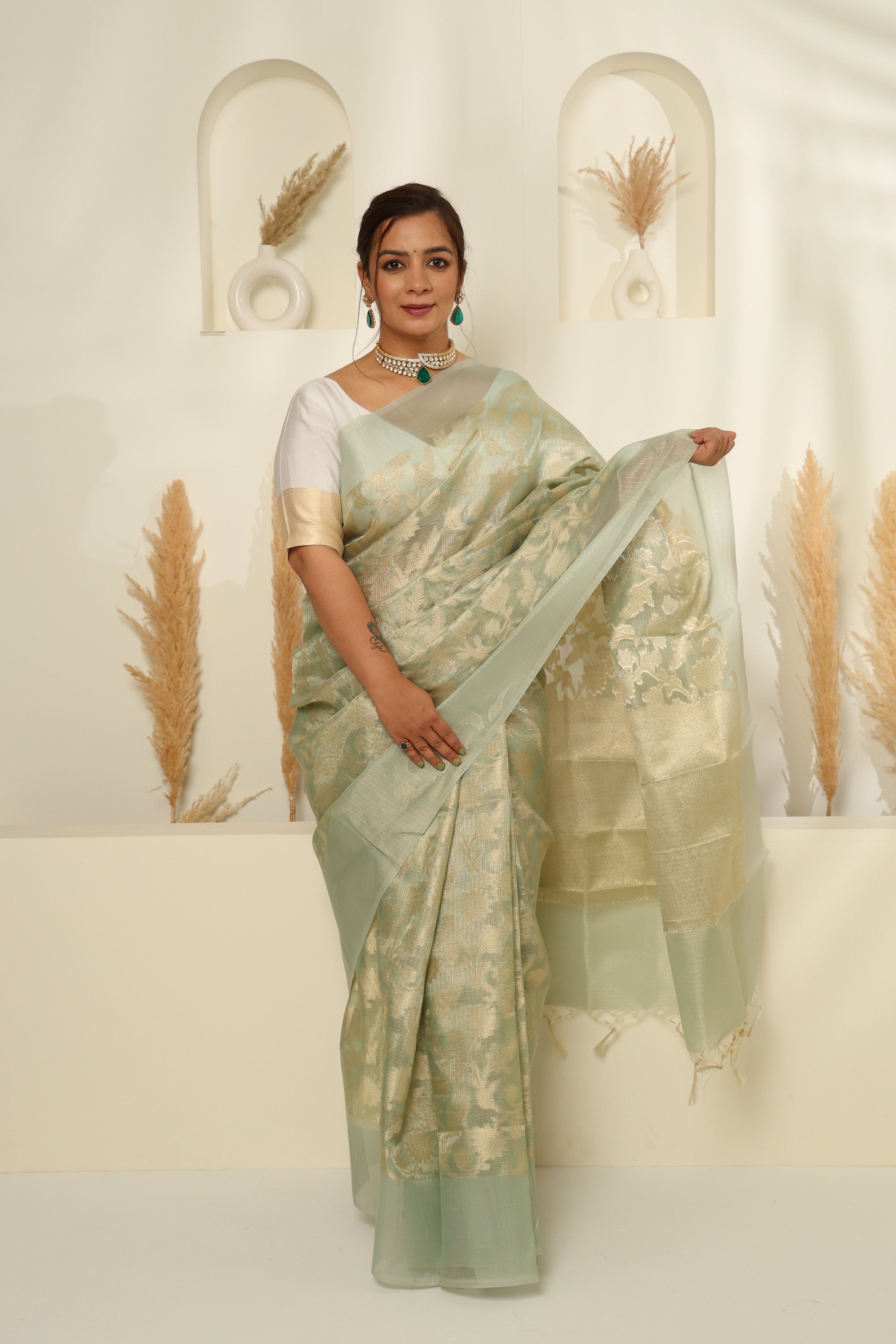 Soft Mint Green Sheer Saree with Gold Zari & Floral Motifs