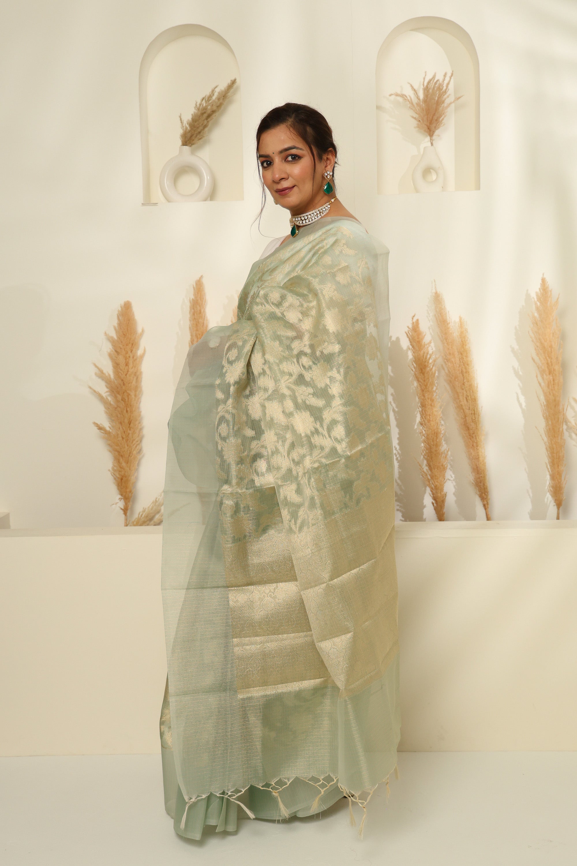 Soft Mint Green Sheer Saree with Gold Zari & Floral Motifs