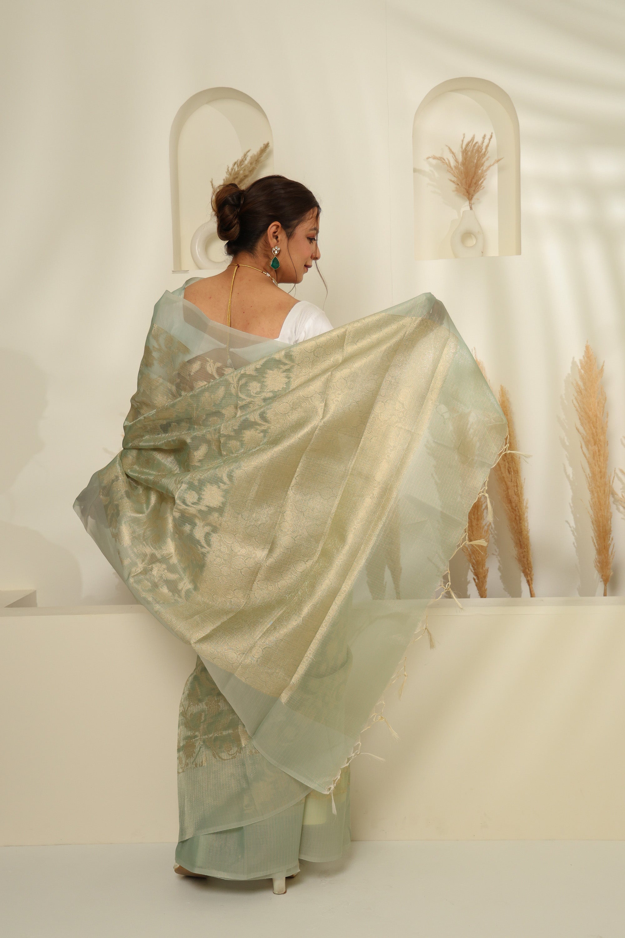 Soft Mint Green Sheer Saree with Gold Zari & Floral Motifs