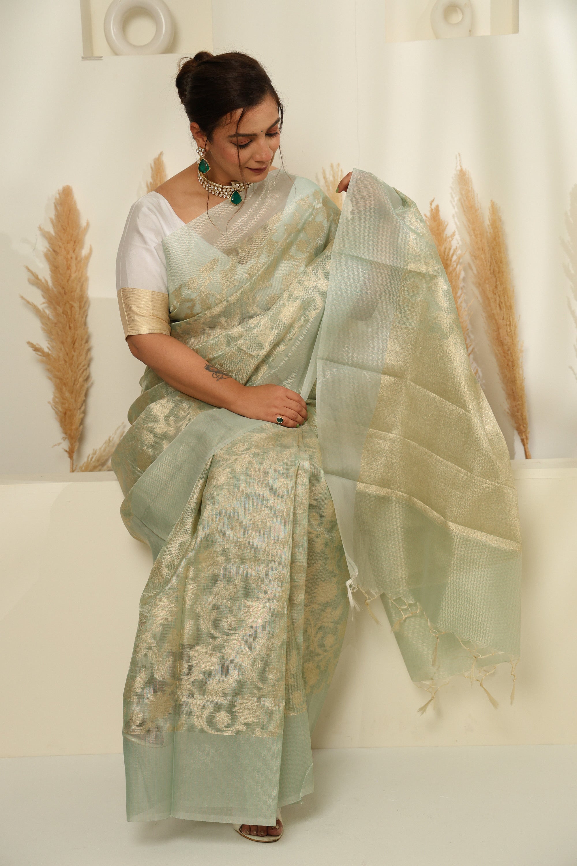 Soft Mint Green Sheer Saree with Gold Zari & Floral Motifs
