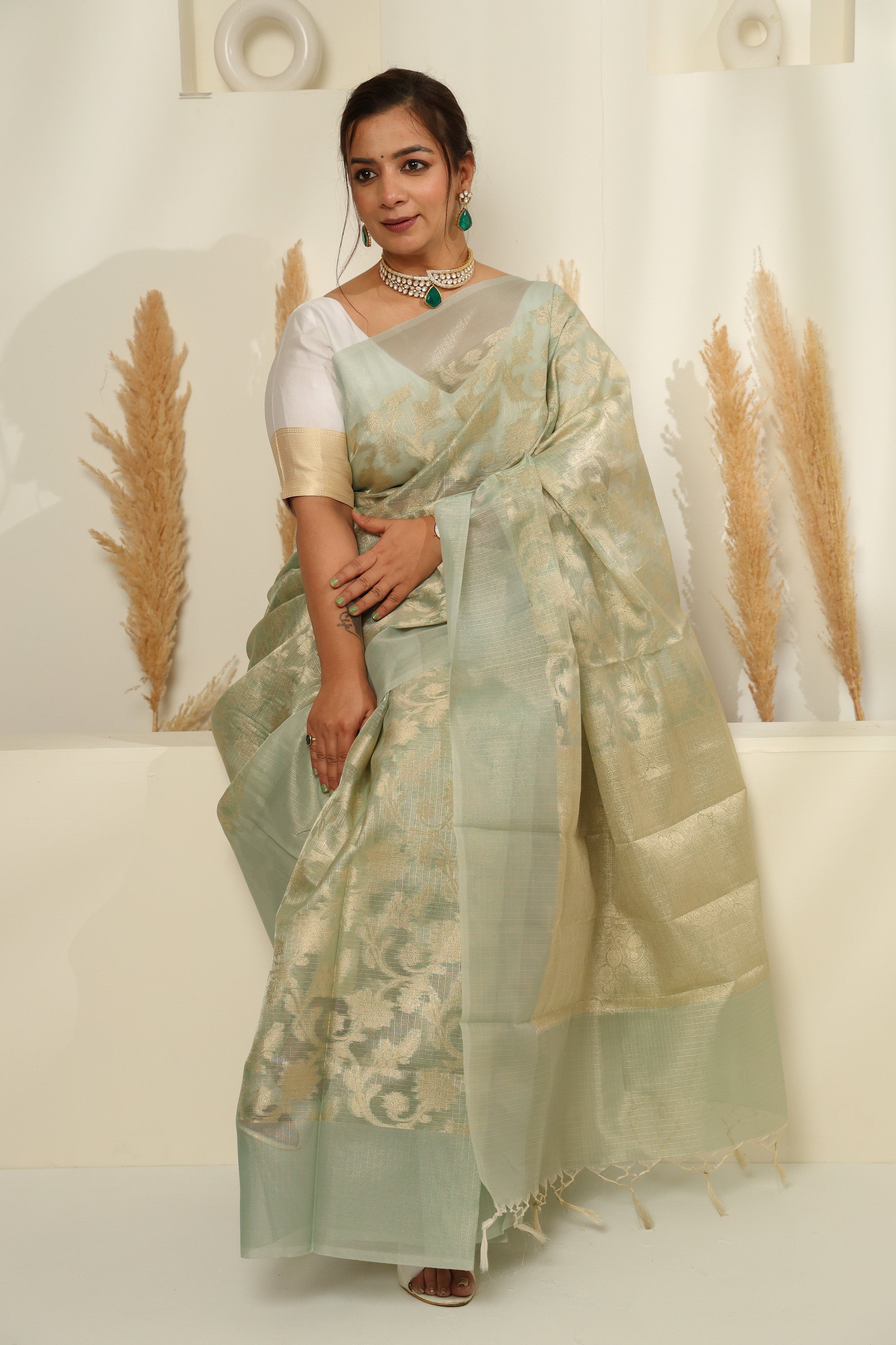 Soft Mint Green Sheer Saree with Gold Zari & Floral Motifs